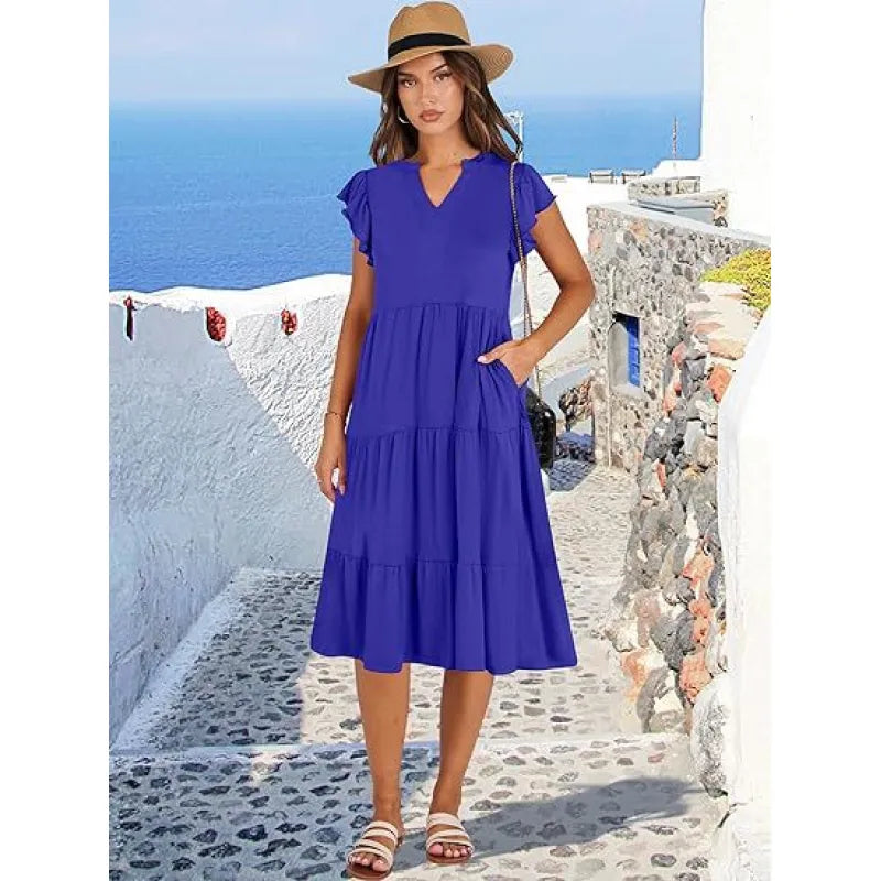 Women's V-neck tiered midi dress with elegant flutter sleeves, perfect for summer casual wear.