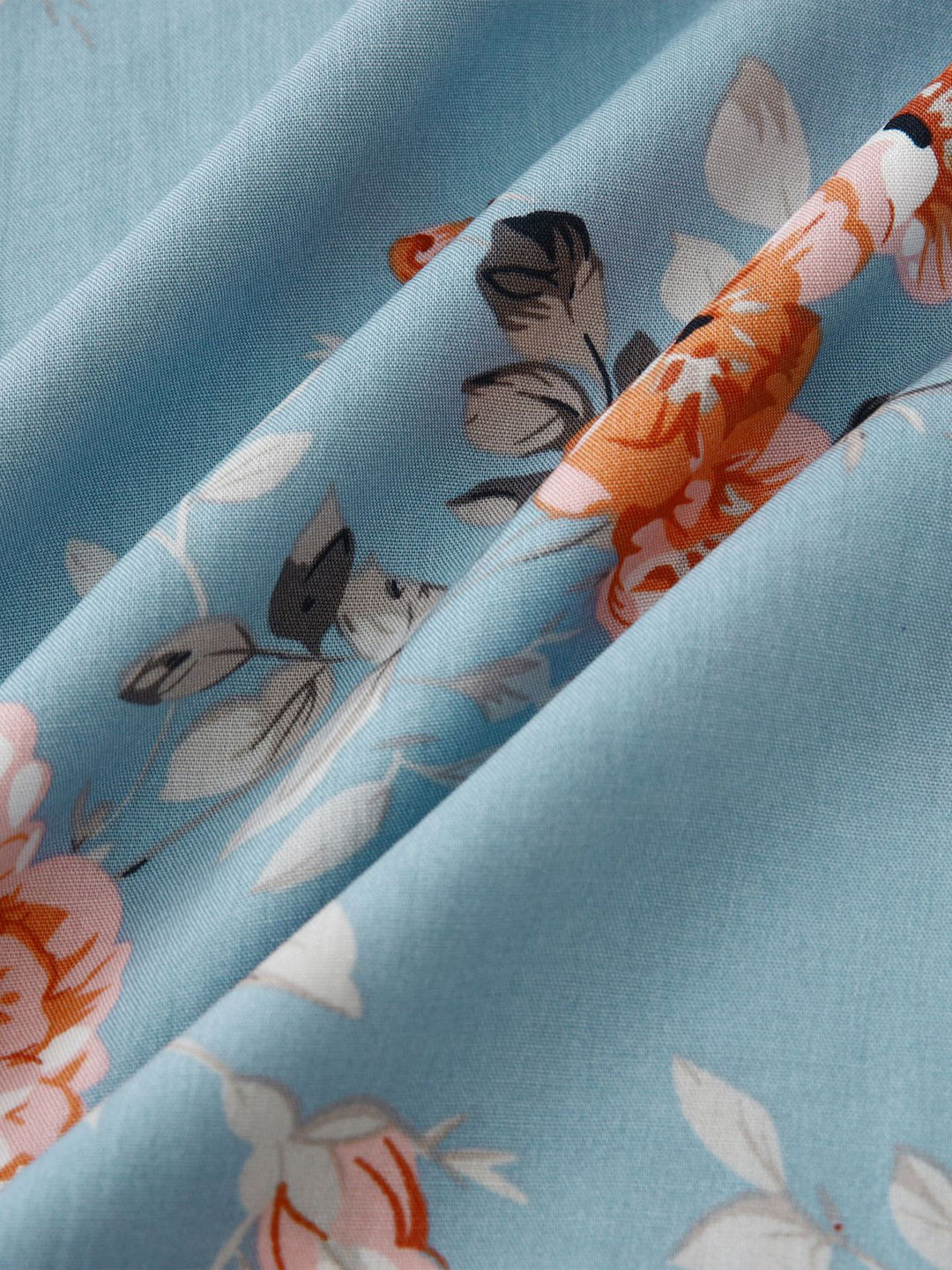 Men's summer button-down shirt with a subtle Kashmir floral print. Short sleeve, versatile style.