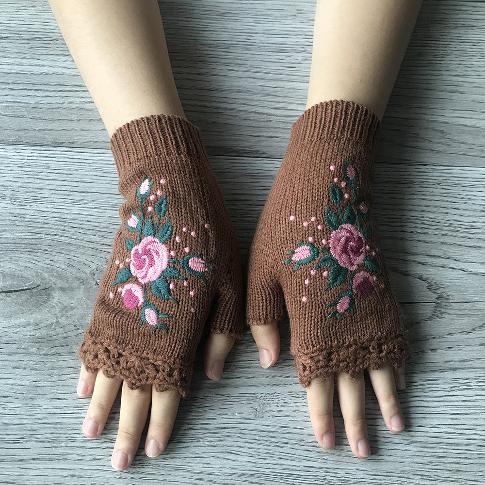 Women's floral fingerless gloves in a vibrant knit, offering warmth & style, an embroidered hand warmer.