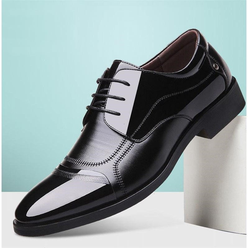 Men's two-tone oxford dress shoes on foot, comfortable and stylish for any formal occasion.