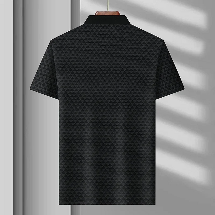 Elevate your everyday style with this men's diamond pattern polo shirt, short sleeve and classic for smart casual.