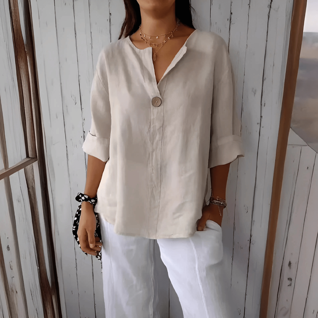 Elegant beige V-neck loose fit women's summer blouse with 3/4 sleeves, perfect for casual or office wear. Plus size friendly.
