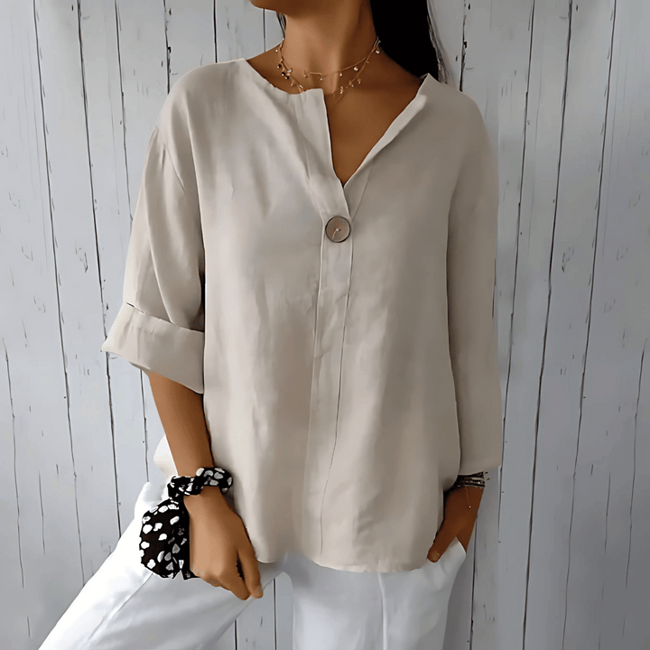 Comfortable V-neck loose fit women's summer blouse in beige. Ideal for everyday fashion & elegant casual wear. Plus size friendly.