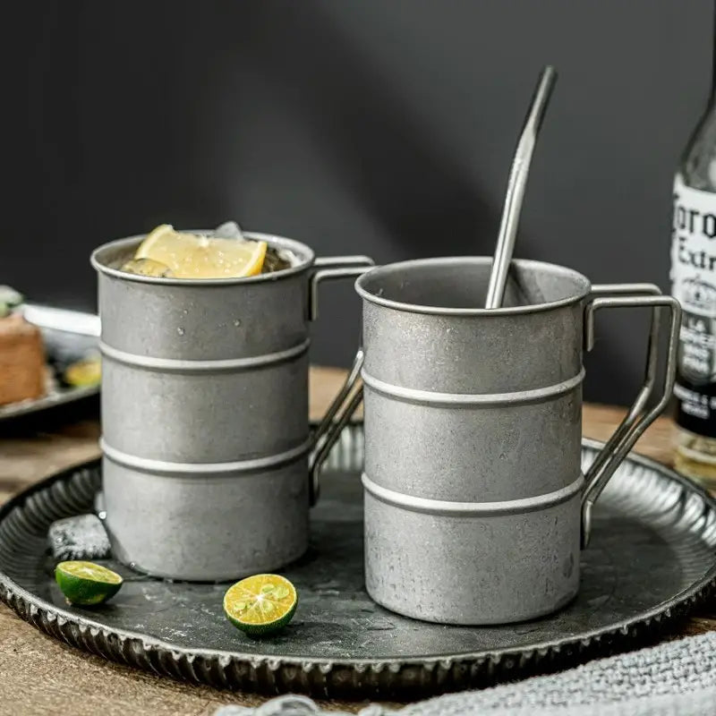 Portable 13 oz vintage stainless steel camping mug, reusable for hot coffee, tea, and outdoor drinks.