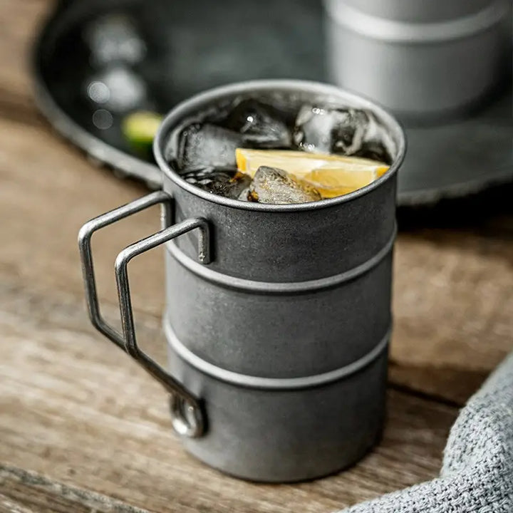 Durable 13 oz vintage stainless steel camping mug for coffee, tea, and all your outdoor hydration needs.
