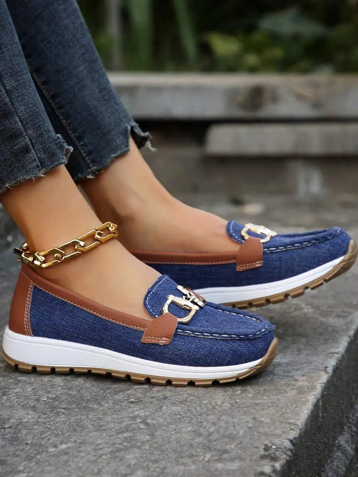 Black women's non-slip orthopedic loafers, elegant & comfortable flats for any occasion.