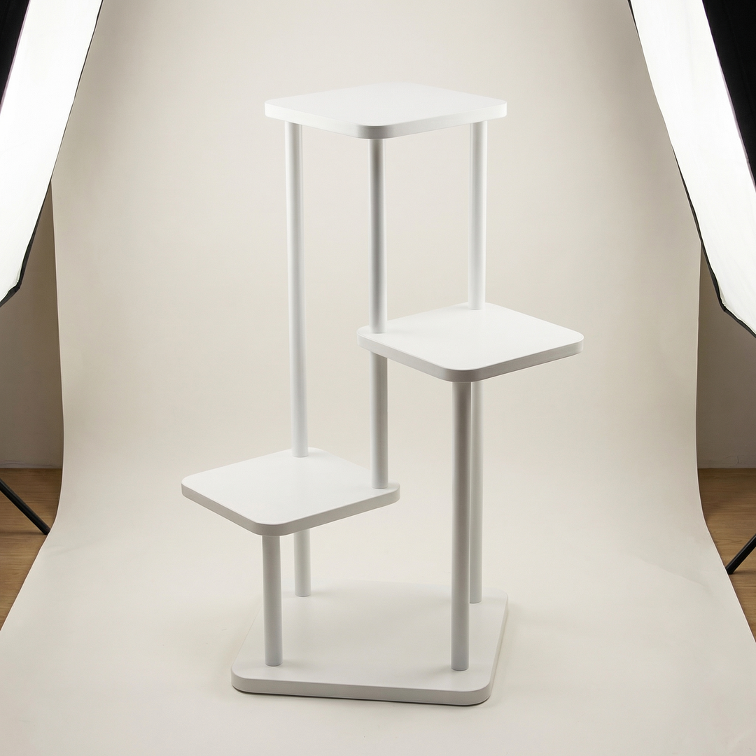 Decorative multi-tier oak plant display stand, a stylish storage solution for indoor plants and home decor.