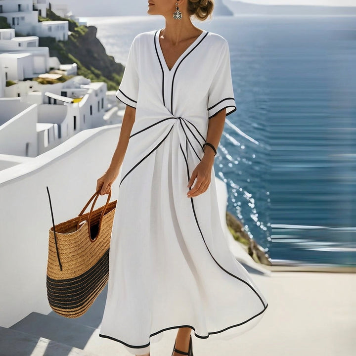 Beautiful women's elegant flowing midi dress, suitable for parties, casual outings, and evening events. Solid hue.