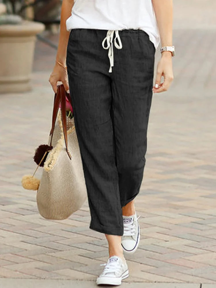 Women's elegant straight leg cropped trousers with drawstring. Perfect for office or casual wear.