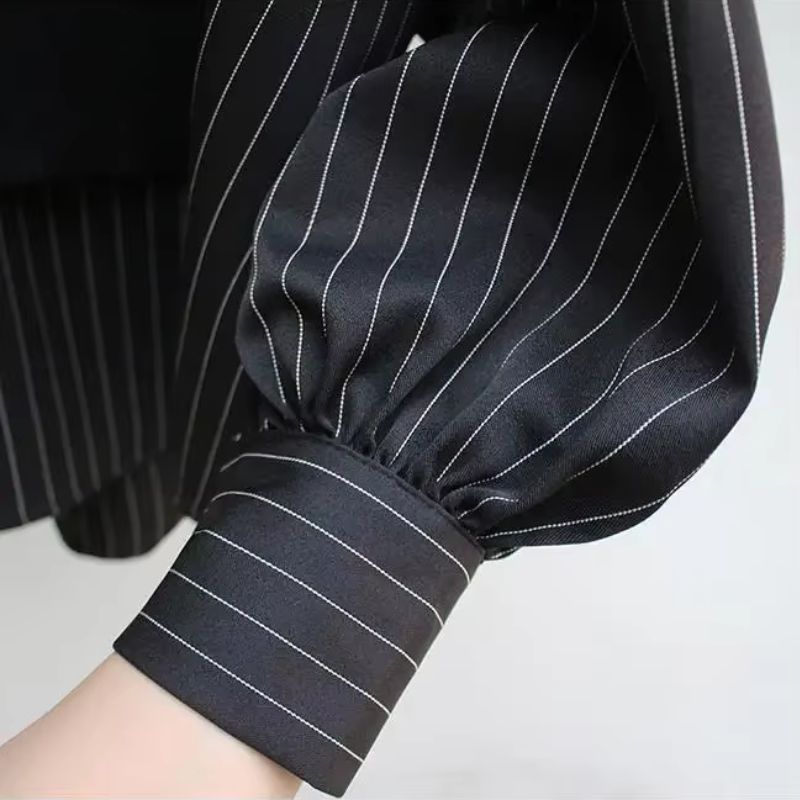 Crisp white women's layered blouse, an elegant and comfortable long-sleeve top for office or casual style.