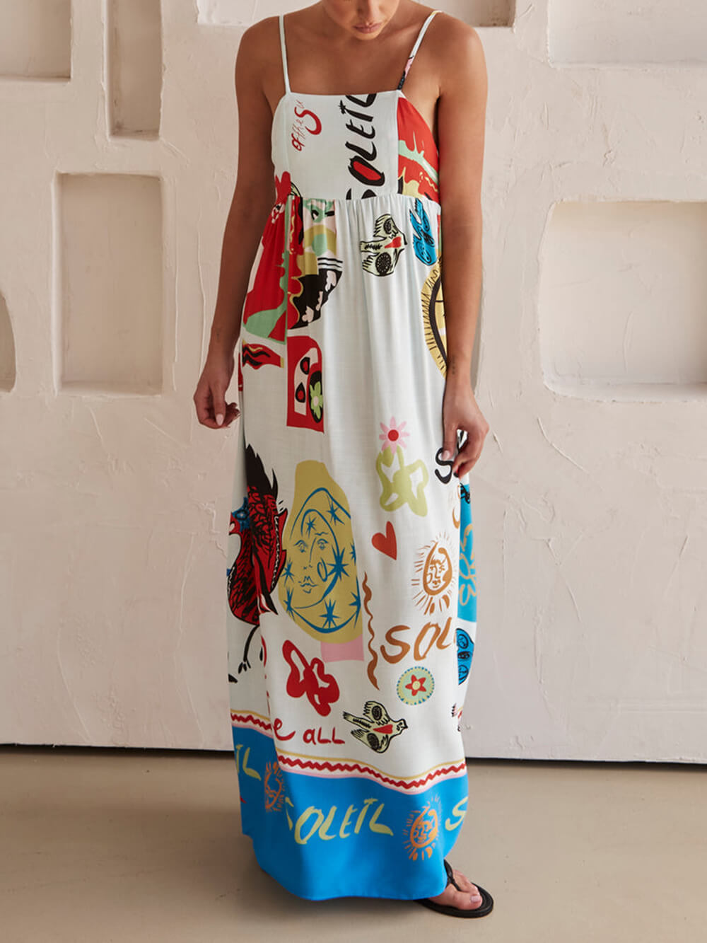 Casual white bohemian maxi dress for ladies, featuring an elegant and relaxed fit.