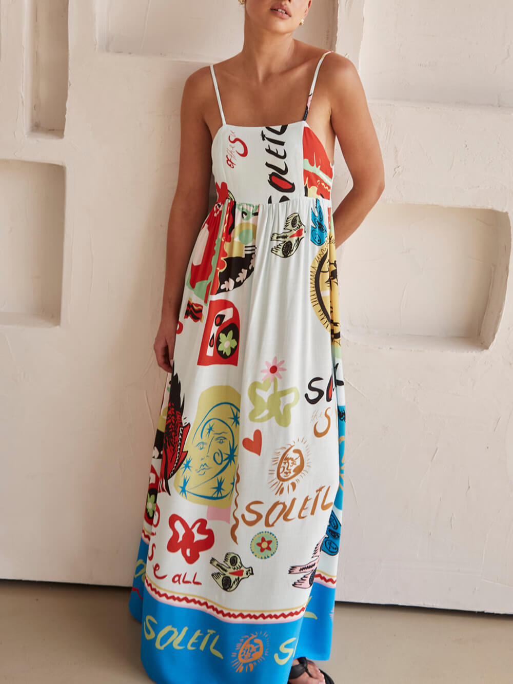 Elegant white women's maxi dress in bohemian style, perfect for summer casual wear.