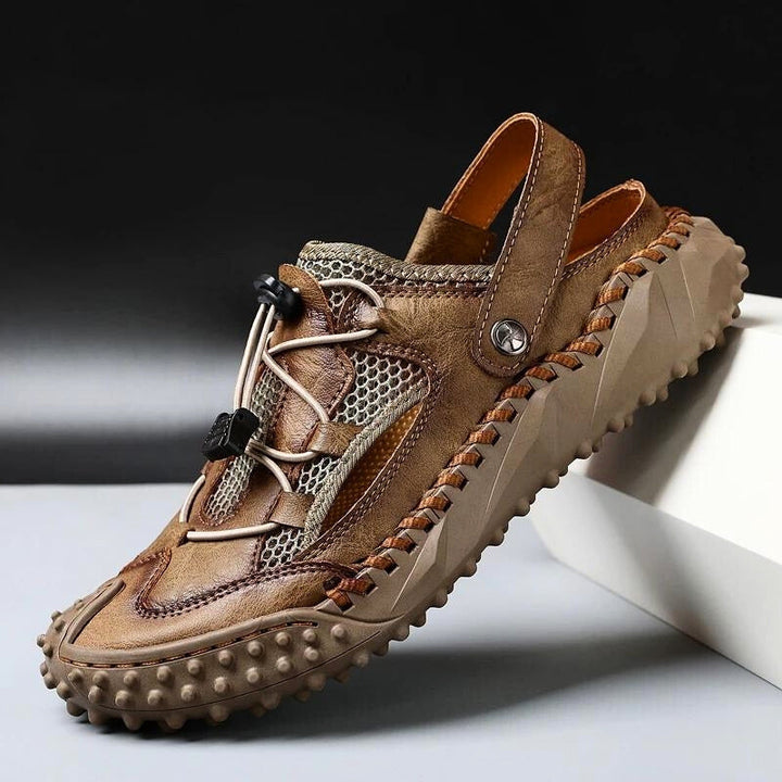 Lightweight men's hybrid sandals for summer comfort. Durable design with secure fit for casual wear and trails.