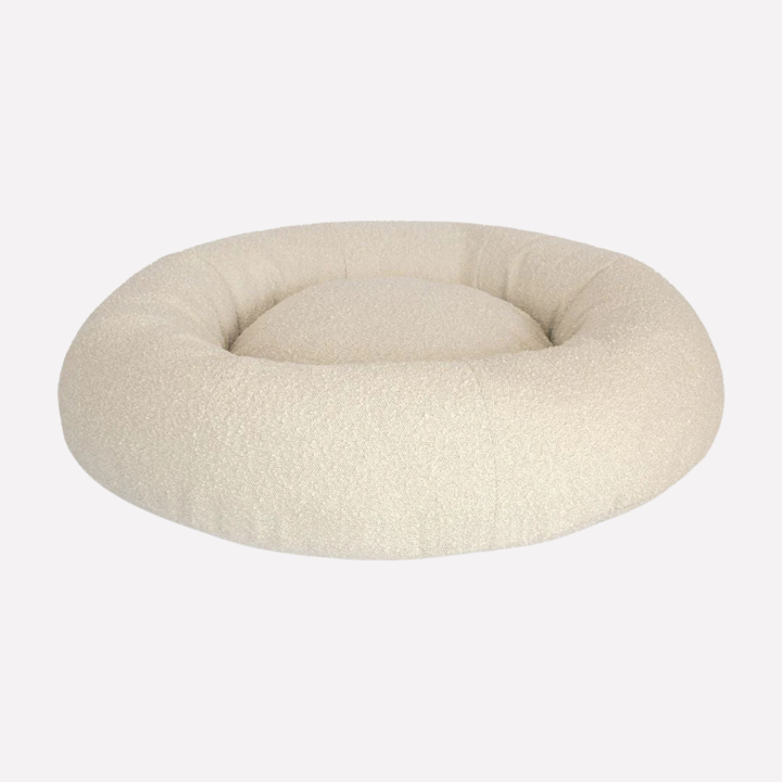 Soft, washable bouclé pet bed for small to medium dogs & cats. Provides luxury comfort & cozy sleep with modern style.