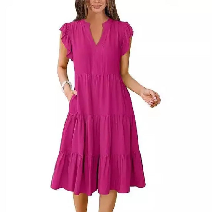Women's V-neck tiered midi dress, a versatile summer piece with airy flutter sleeves.