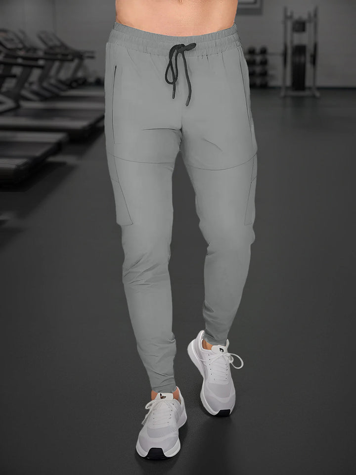 Durable Valenza men's gym joggers, quick-dry stretch fabric, built for intense workouts.