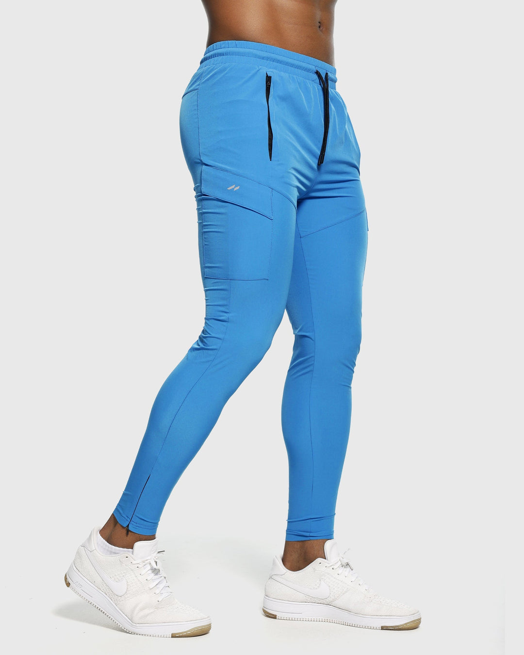 Close-up of Valenza men's joggers' quick-dry stretch fabric texture, showing quality.