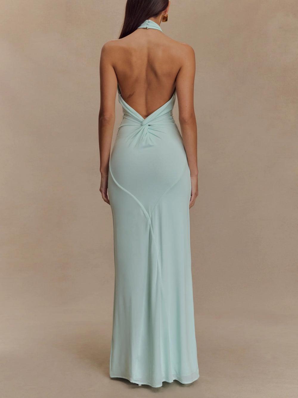 Women's flowy halter open back maxi sundress. Perfect for summer, beach, casual wear, or vacation outfit.