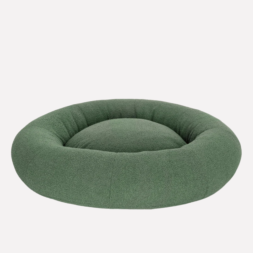 Modern forest green bouclé pet bed for dogs & cats. Stylish, comfortable, & washable luxury animal bed.