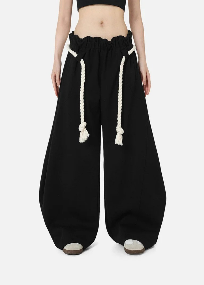 Baggy, oversized women's barrel leg sweatpants with a high elastic waist, offering ultimate comfort and style.