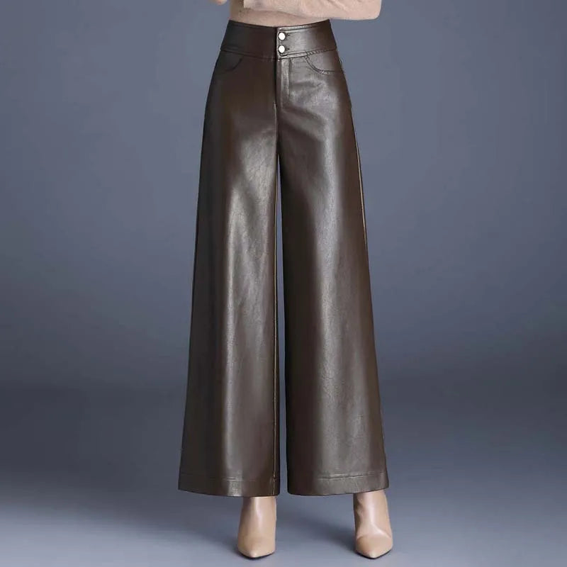Stylish women's wide-leg, high-waist pants. Perfect for party wear or casual outfits. Sleek and comfortable stretch fit.