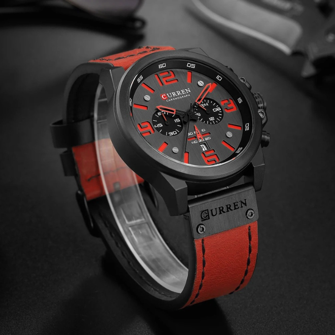 A durable men's stainless steel chronograph watch with an elegant black leather strap.
