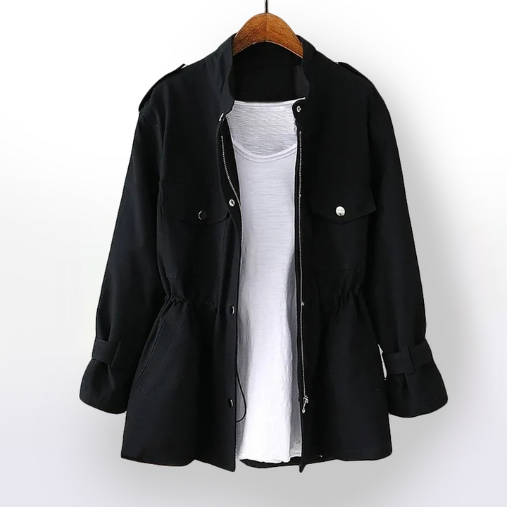 Women's stylish waterproof jacket. Fashionable rainwear with a cinched waist for all-weather protection.