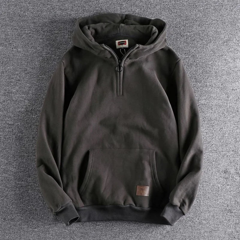 Navy men's quarter-zip hoodie, a relaxed fit top perfect for men's fashion and layering.