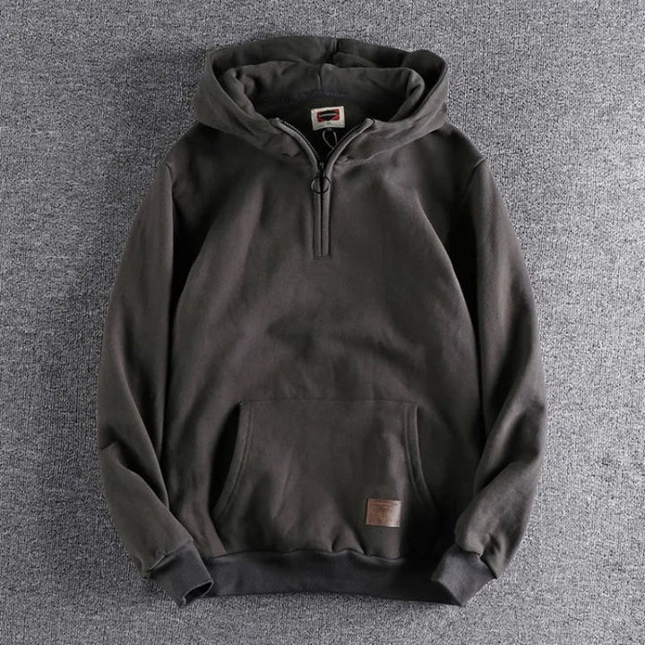 Navy men's quarter-zip hoodie, a relaxed fit top perfect for men's fashion and layering.