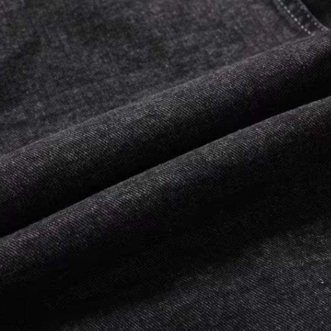 Black denim trucker jacket, ideal for casual wear, fall fashion, and versatile layering.