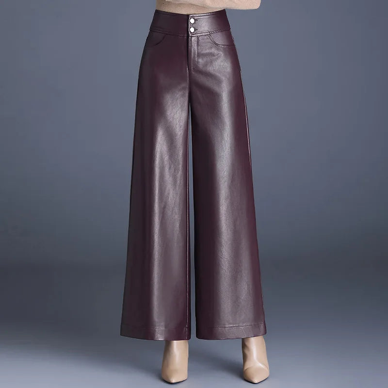 Elegant high-rise wide-leg pants for women, offering a modern, chic style. Available in black, coffee, or deep plum.