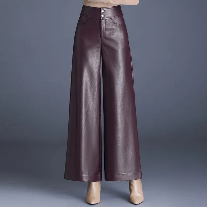 Elegant high-rise wide-leg pants for women, offering a modern, chic style. Available in black, coffee, or deep plum.