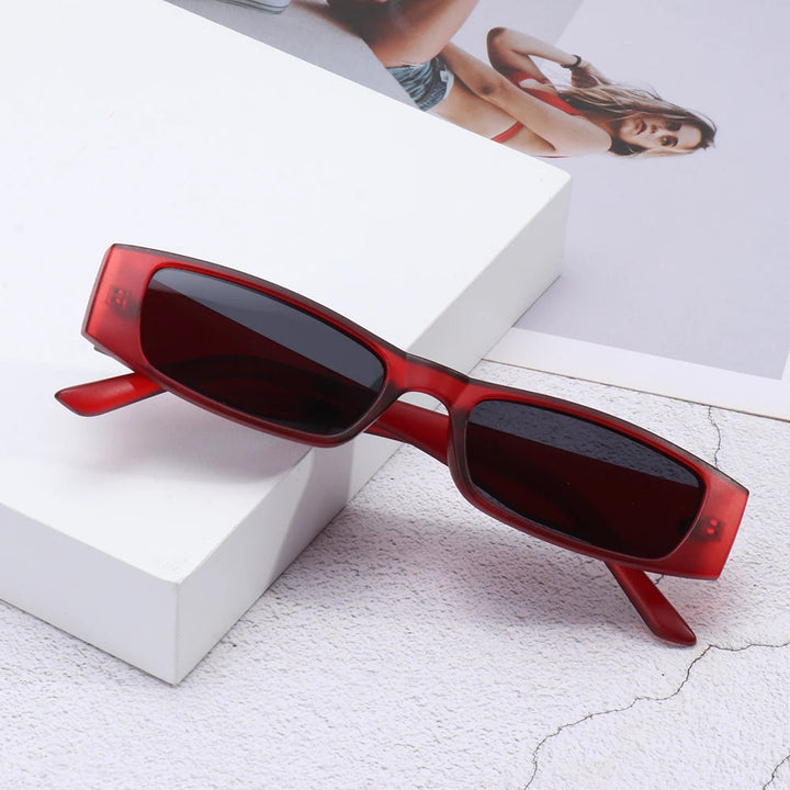 Fashion-forward women's retro slim shades, perfect 90s accessory with crucial UV400.