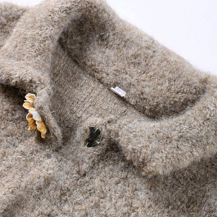 Cozy women's gray vintage floral print knit cardigan. Fashionable long-sleeve button-up sweater for elegant style.