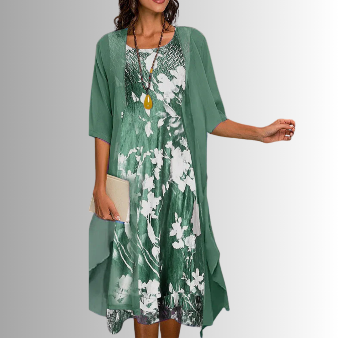 Elegant women's floral midi dress & sheer cardigan set, perfect for special occasions & daytime events.