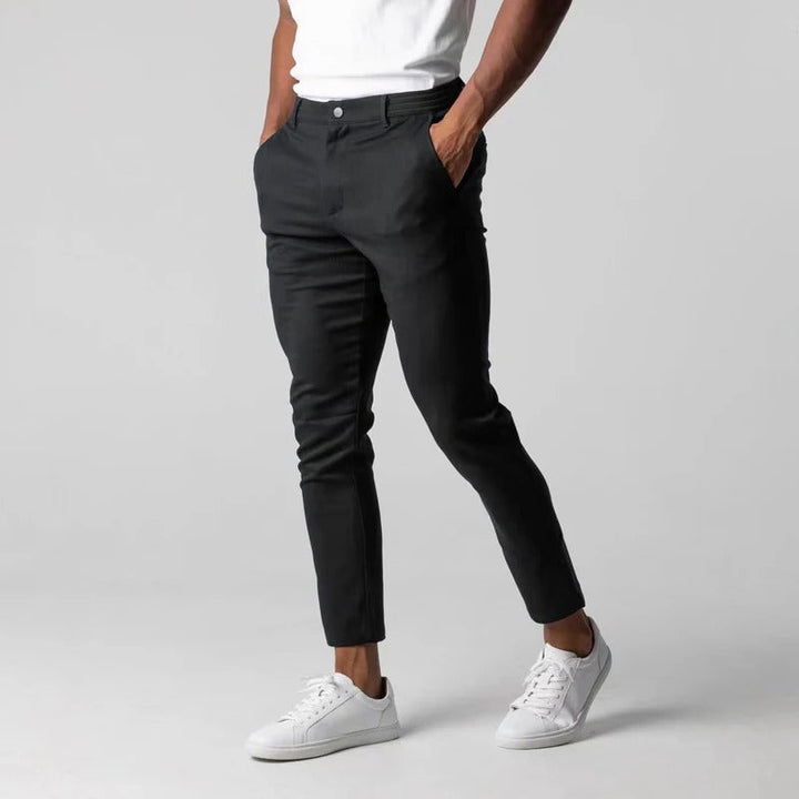 Stretch comfort men's chinos. Stylish tailored fit pants, essential for versatile everyday men's fashion.