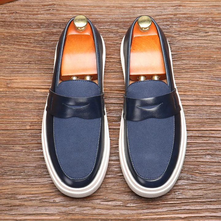 Premium texture of Men's Kensington slip-on loafers. Sophisticated mens footwear for a refined look.