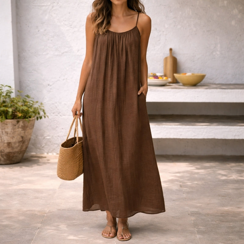 Women's spaghetti strap maxi sundress, elegant summer beach fashion.