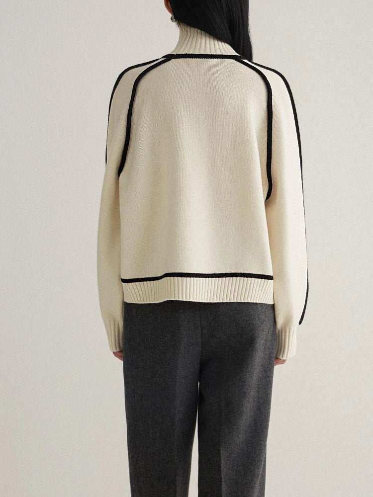 Versatile women's turtleneck sweater, perfect for everyday style. Features cozy fabric & contrast details.