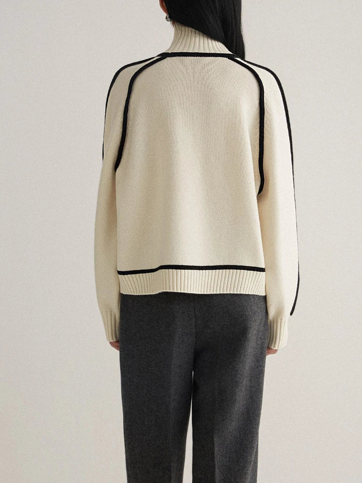 Versatile women's turtleneck sweater, perfect for everyday style. Features cozy fabric & contrast details.