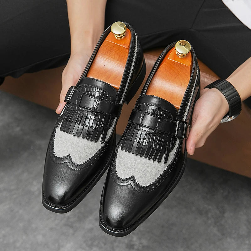 Stylish men's slip-on brogue loafers, ideal formal or smart casual wingtip dress shoes.