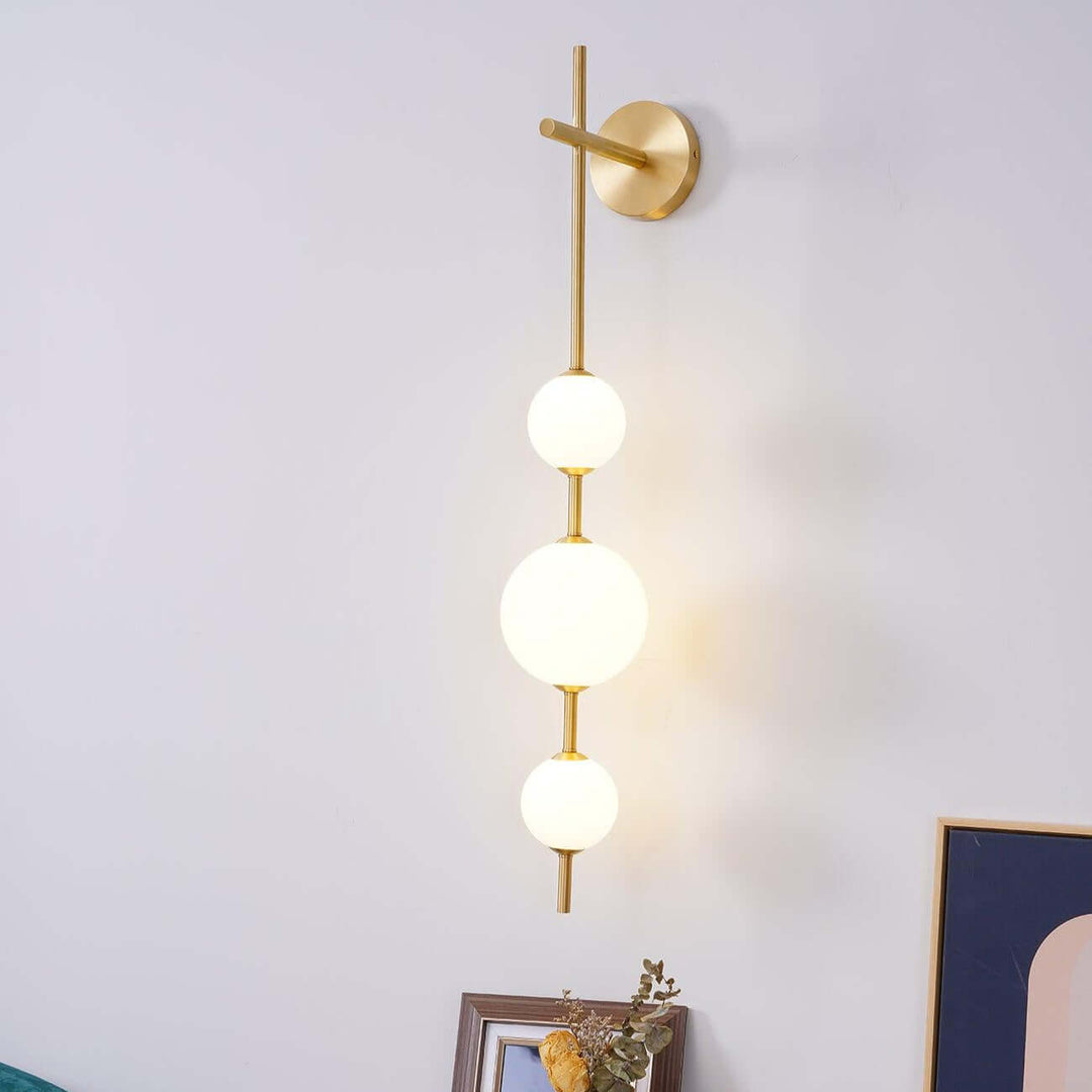 Vertikale Kugel-Wandleuchte Goldoptik