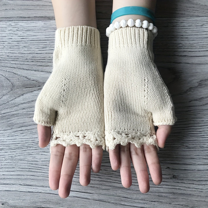 Elegant hand-embroidered floral fingerless gloves for women, a cozy knit accessory & stylish hand warmer.