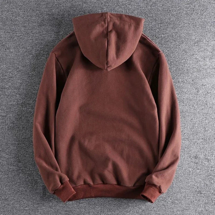 Comfortable men's quarter-zip hoodie, perfect for relaxed casual wear and versatile fall fashion.