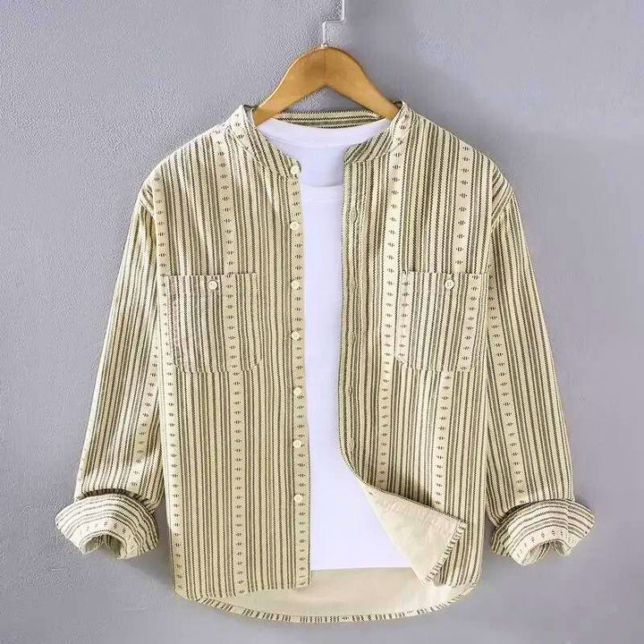 Women's striped button-down shirt in apricot. Relaxed fit long-sleeve top, a classic & versatile choice for summer fashion.