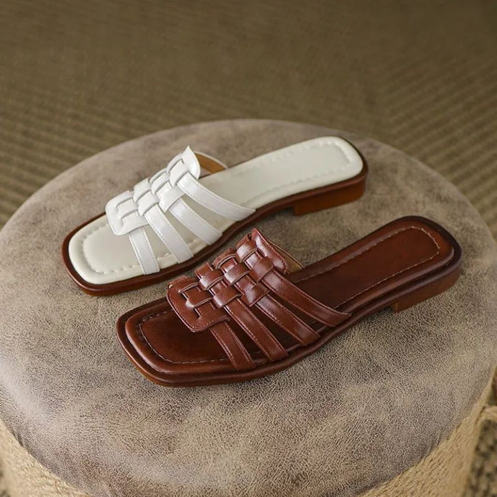 Women's Tivra slide sandals, cushioned comfort, geo cutout, flat sole; ultimate casual fashion footwear.