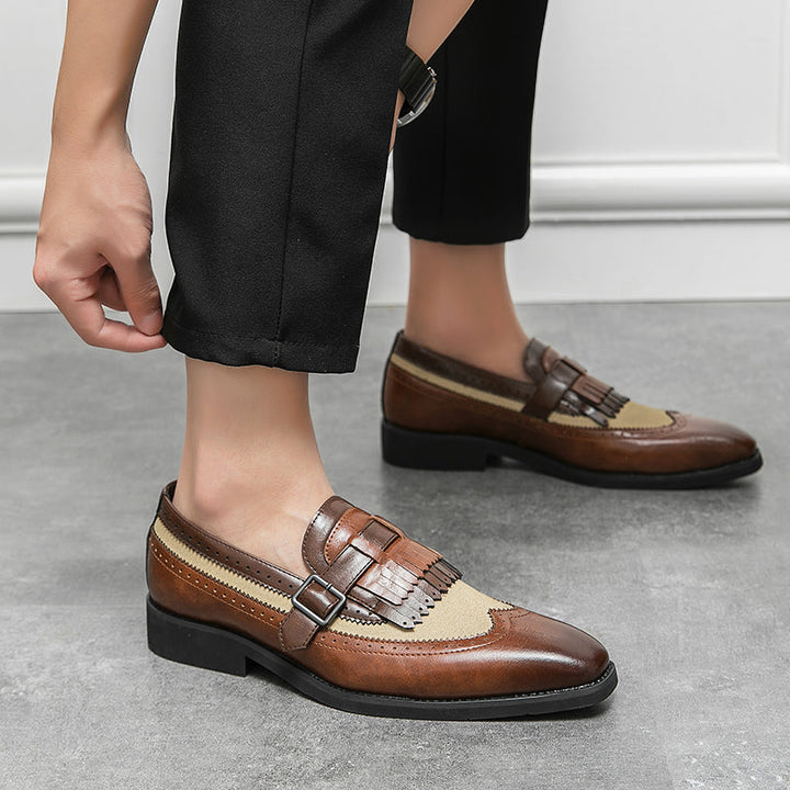 Sophisticated men's brogue footwear, Regent wingtip slip-on loafers for formal occasions.