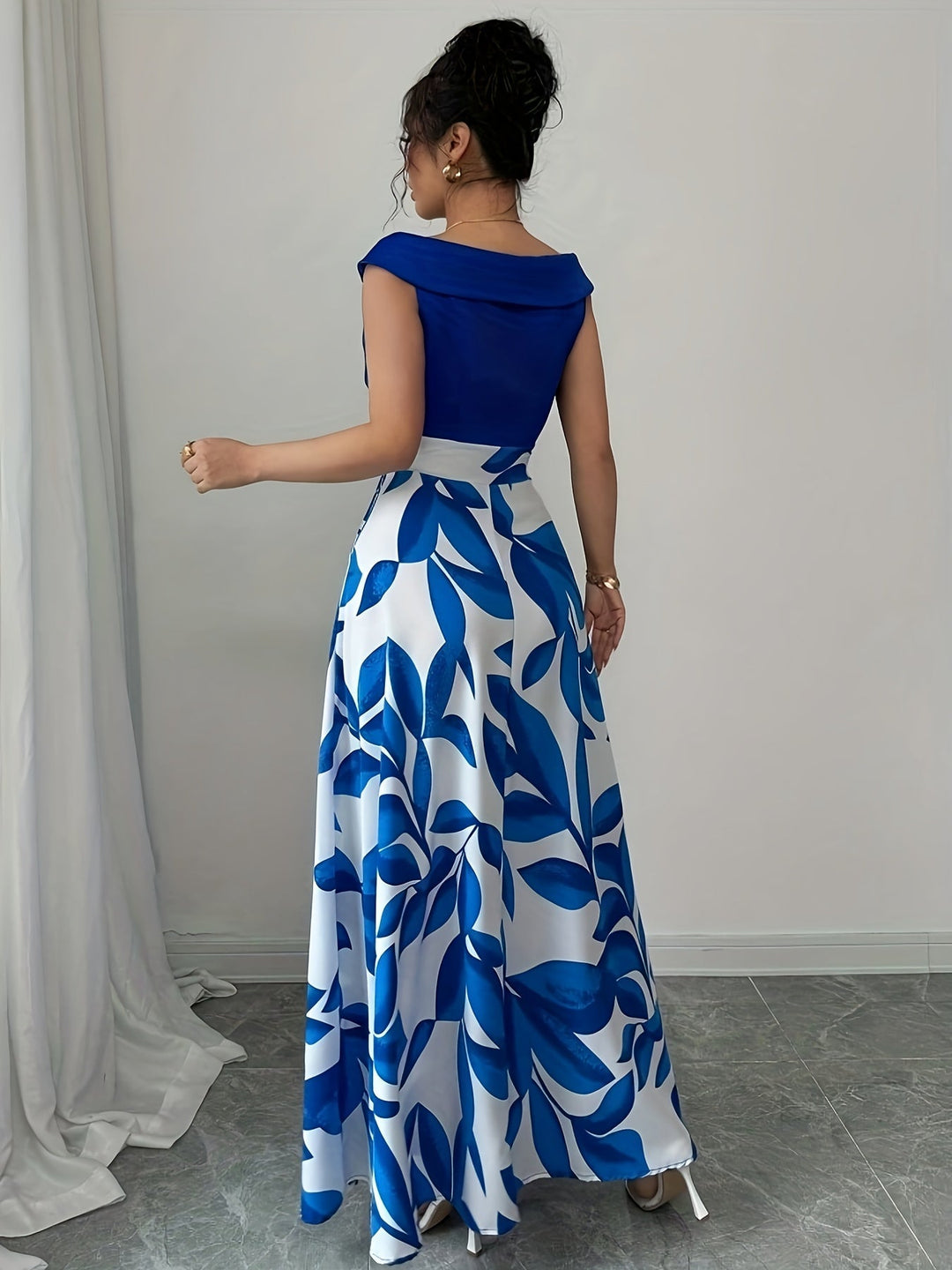Flowing women's A-line maxi dress, featuring a classic V-neck. An elegant formal party dress.