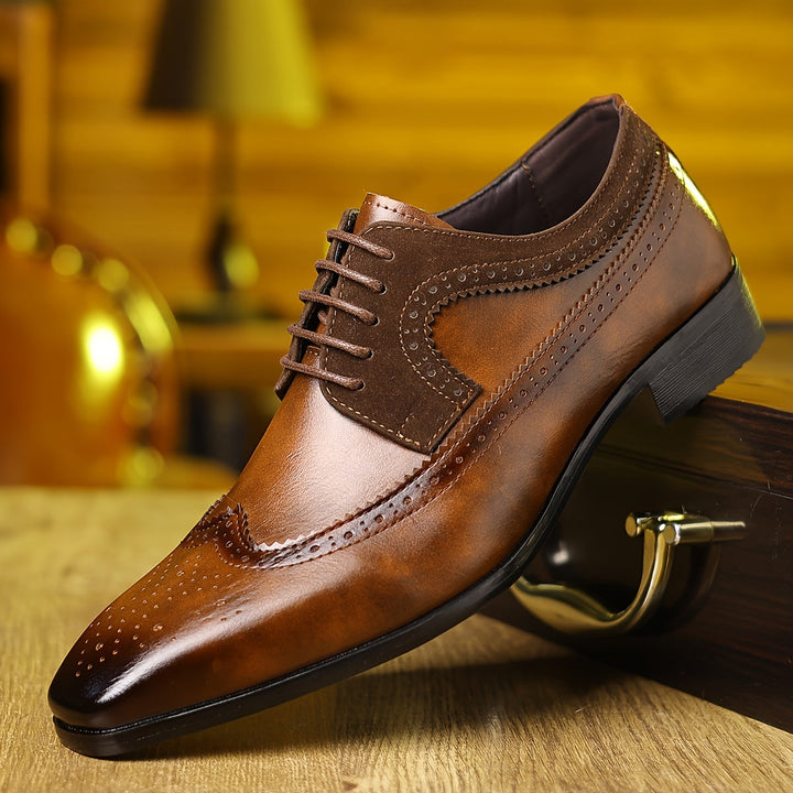 Classic men's black Oxford brogue dress shoes with sophisticated lace-up design for formal occasions.