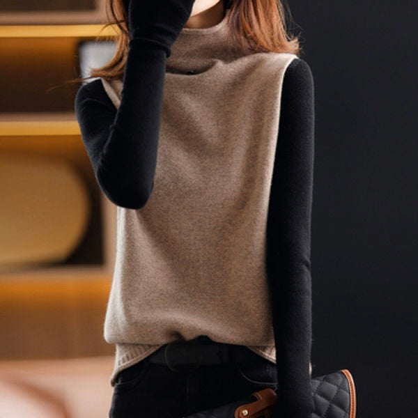 Close-up of a women's chic sleeveless turtleneck knit vest top, highlighting the soft texture.